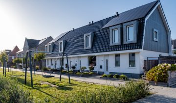 Dutch Suburban area with modern family houses, newly build modern family homes in the Netherlands, dutch family house, apartment house. Netherlands, newly build street with modern house